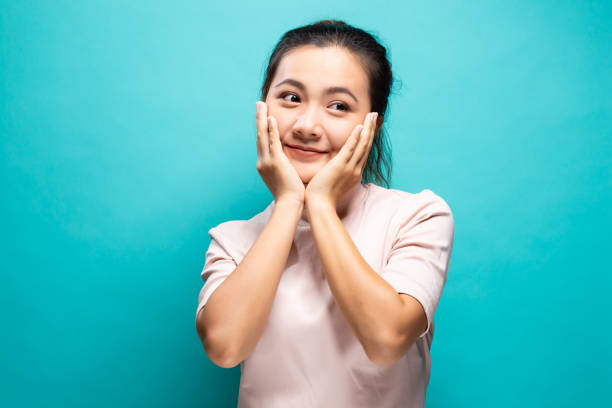 istock Happy woman standing isolated over blue background 1091603880