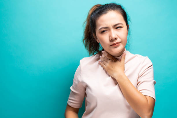 istock Woman feeling sick with sore throat 1091607756