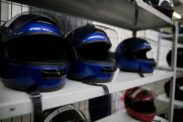 istock extreme sport helmets on the shelf with white background 1091608154