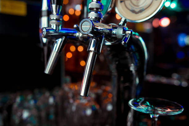istock Beer taps in a pub. Close up of beer Tap. Selective focus. 1091620210