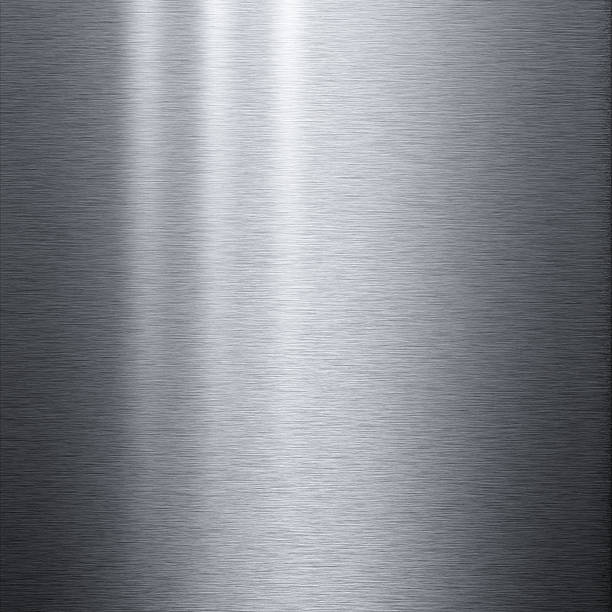 istock Brushed aluminum metallic plate with light reflecting on it 109162176