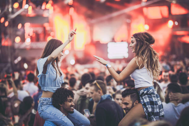 istock Happy couples having fun on a music concert. 1091623696