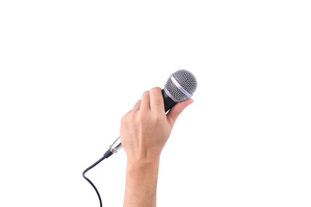 hand with a microphone isolated on white background stock photo