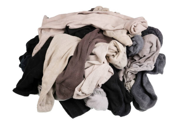 istock The old worn dirty  men's socks  heap. Isolated 1091640280