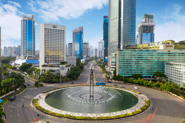 Welcome to Monument with quiet road JAKARTA - Indonesia. January 02, 2019: Top view of Selamat Datang Monument with quiet road in the Jakarta downtown jakarta stock pictures, royalty-free photos & images