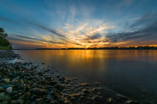 A beautiful sunset near Burton, New Brunswick, Canada looking out over the Saint John river.