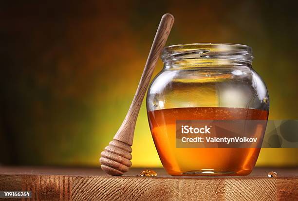 Pot Of Honey And Wooden Stick Stock Photo - Download Image Now - Color Image, Cooking Pan, Drinking Glass
