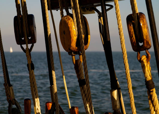 Details of marine vessel rigging, pulleys and ropes on a tall ship