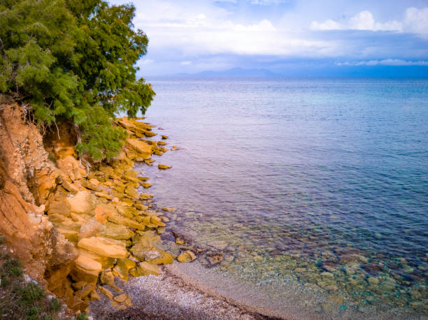 istock Sunrise colored water on a Mediteranean beach 1091670432
