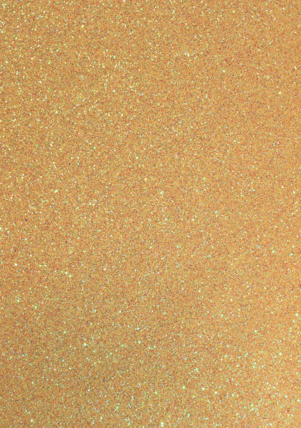 istock golden background with many glittery shimmering glitter in verti 1091674126