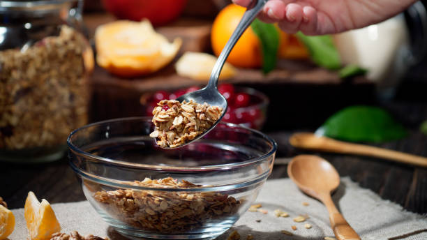 istock Preparing a portion of granola 1091674660