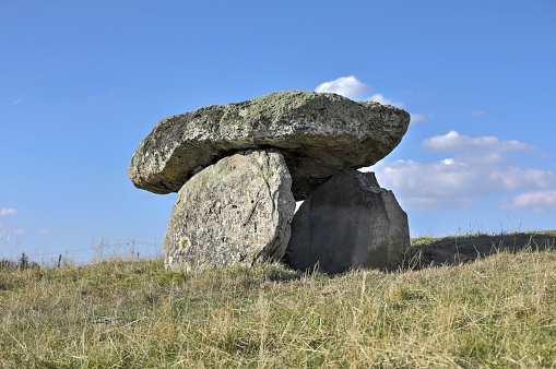French dolmen situated in Cantal, Auvergne, France near Saint flour city. It is composed with two vertical megaliths supporting a large flat horizontal capstone or \