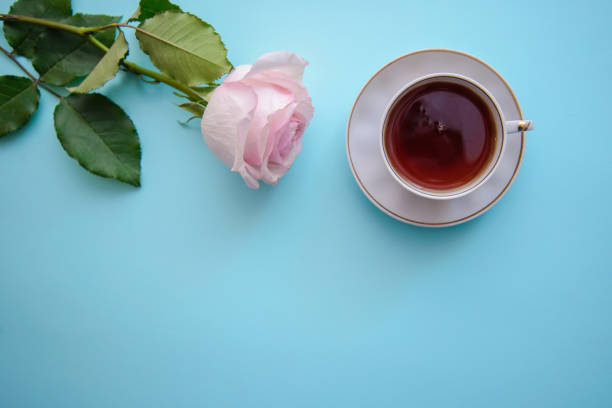 istock Romantic picture with a rose and a cup of tea 1091677428