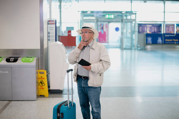 istock Confused Senior Man at Airport 1091683360
