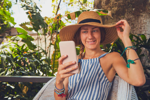 istock Cute girl using cellphone  on a terrace. 1091686028