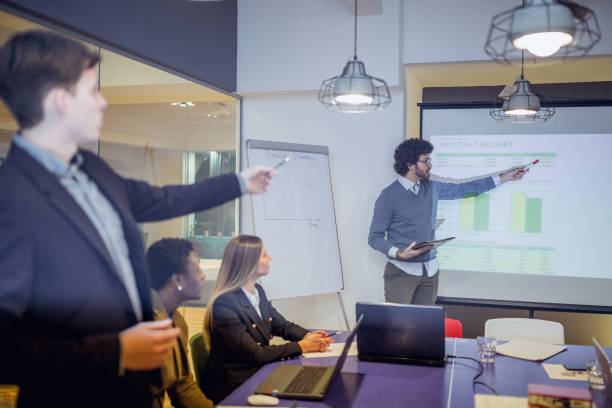 istock Young business man having a presentation in board room 1091688150
