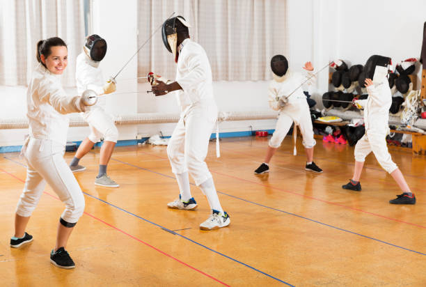 istock Woman training fencing movements 1091688916