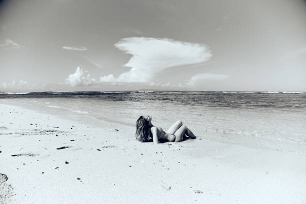 istock Slim woman enjoying on a sandy tropical beach. 1091697142