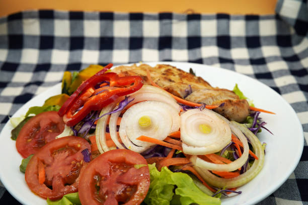 grill chicken salad with green leaf and vegetable