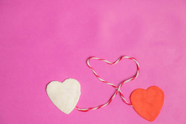 istock Big hearts on pink background with space for text, Love icon, valentine's day, relationships concept 1091706376