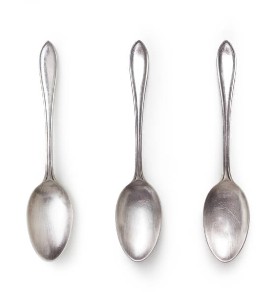 istock old silver spoon isolated on white with clipping path included 1091706494