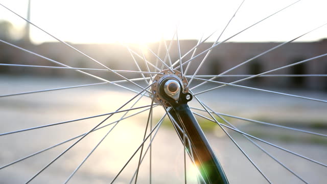 Rotating bicycle wheel
