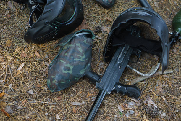 istock Paintball. Charge the weapon. Helmet for paintball 1091709690