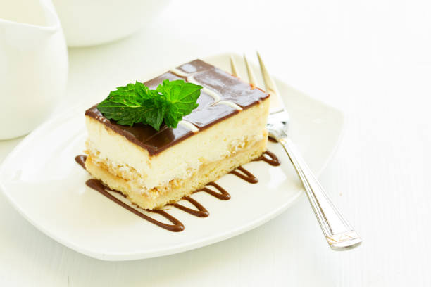 A piece of cheesecake with apple stuffing.