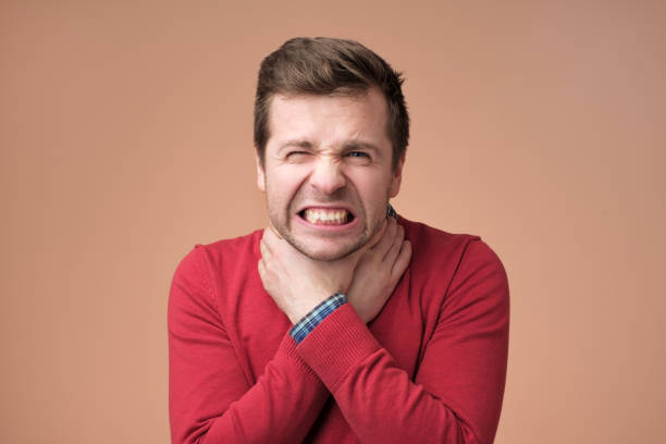 istock Young man having asthma attack or choking can not breath suffering from respiration problems 1091713272