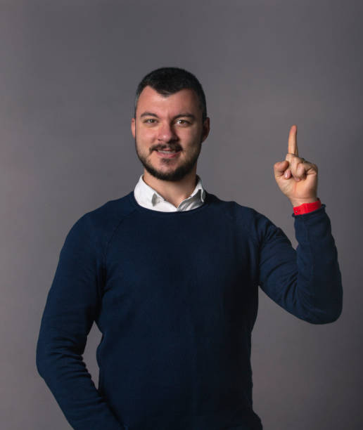 istock Casual Man is Pointing On The Isolated Background 1091714232