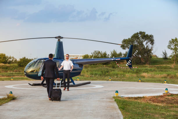 istock Helicopter pilot giving welcome gesture to passenger 1091719180