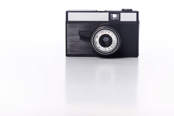 istock Close-Up Of Old Camera Against White Background 1091730660