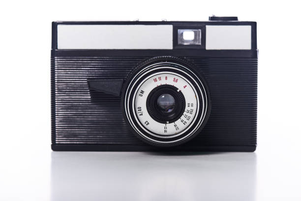istock Close-Up Of Old Camera Against White Background 1091730696