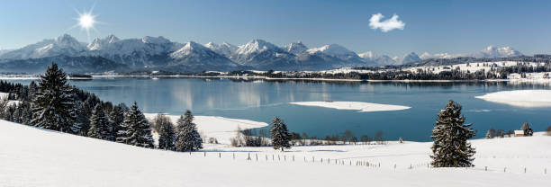 istock idyllic panorama landscape in Bavaria at winter 1091731028