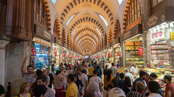 Istanbul,Turkey - September 2018: People walk and shop in grand bazaar, famous for jewelery and Turkish carpet shopping