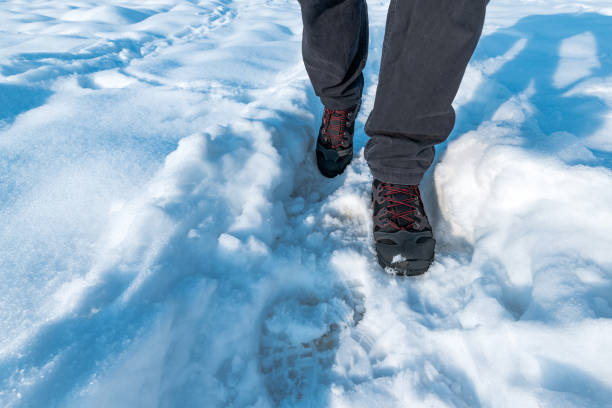 istock Man walking in snow 1091733958