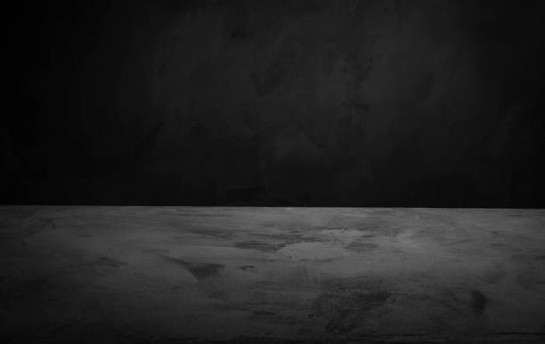 istock Dark room concrete background. Black wall and floor interior background with space horizontal 1091734300