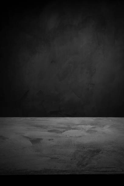 istock Dark room concrete background. Black wall and floor interior background with space 1091734304