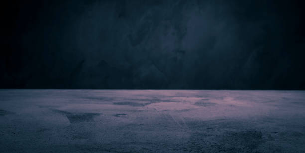 istock Dark room concrete pink background. Black wall and floor interior background with space horizontal 1091735748