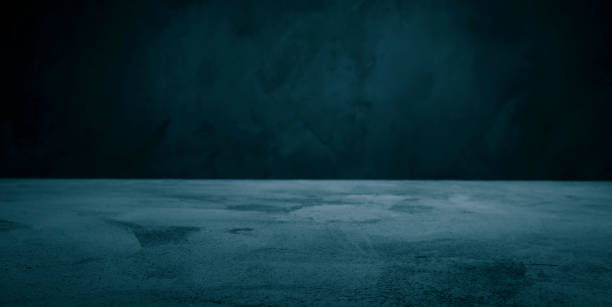 istock Dark room concrete turquoise background. Black wall and floor interior background with space horizontal 1091735750