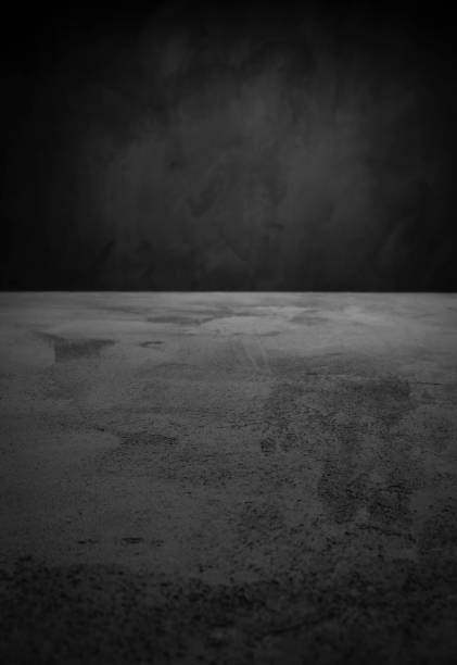 istock Dark room concrete background. Black wall and floor interior background with space 1091736690