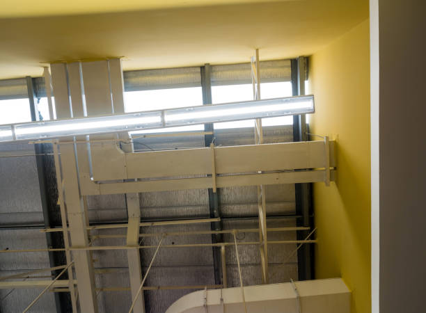 istock Ceiling mounted Lamps pipes and air ducts and communication system 1091736934