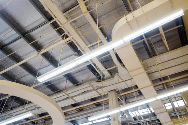 istock Ceiling mounted Lamps pipes and air ducts and communication system 1091736944