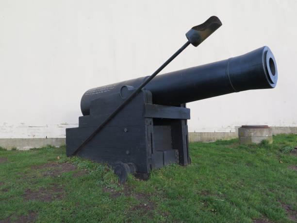 istock Old cannon against grey winter clouds in Southern Denmark 1091737380