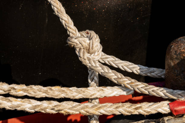 istock Ropes or hawsers with a mooring bollard 1091744346