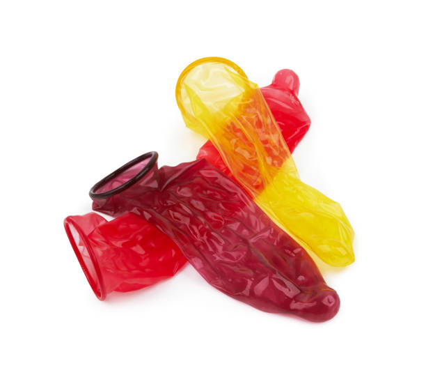 kolorowe prezerwatywy odizolowane - condom old penis sensuality zdjęcia i obrazy z banku zdjęć