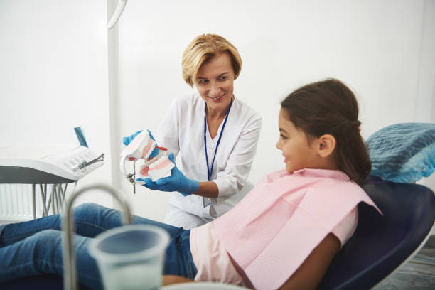 istock Cheerful nice girl vising her professional dentist 1091745794