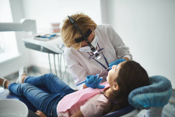 istock Young lady is being examined by dental professional 1091746086