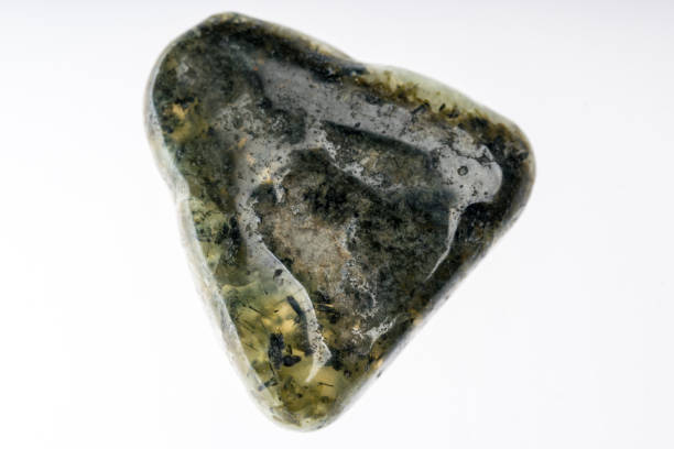 istock Prehnite mineral stone sample with white background 1091748888