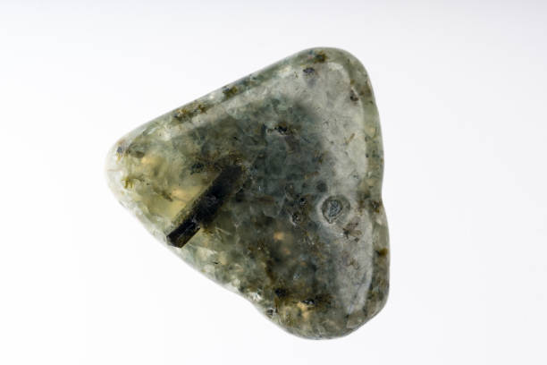 istock Prehnite mineral stone sample with white background 1091748972